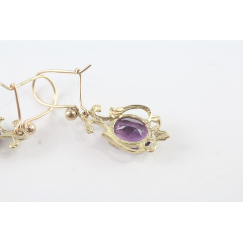 136 - 9ct gold amethyst ornate drop earrings (2.5g)