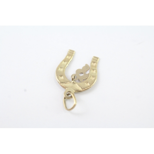 137 - 9ct gold horseshoe charm with R + T bar and diamond heart charm (1.6g)