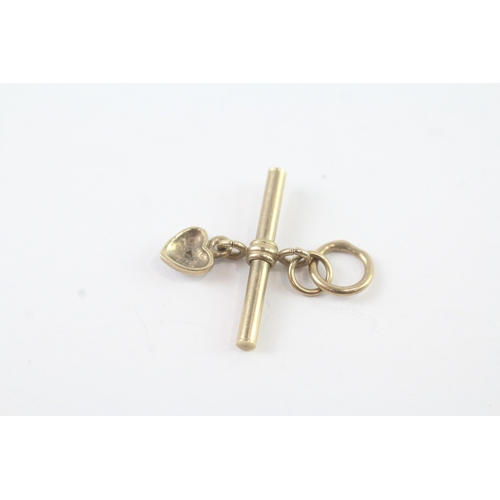 137 - 9ct gold horseshoe charm with R + T bar and diamond heart charm (1.6g)