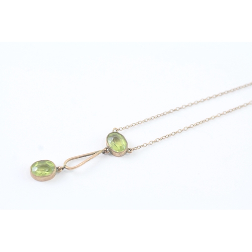 140 - 9ct gold green paste lavalliere necklace (2.7g)