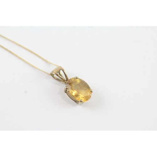 144 - 9ct gold citrine single stone pendant on chain (1.1g)