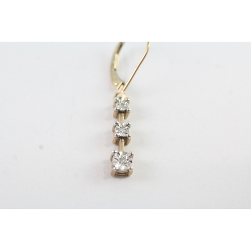 147 - 9ct gold diamond drop earrings (2.5g)