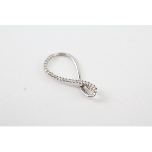 150 - 9ct white gold x2 diamond twist heart set (1.4g)