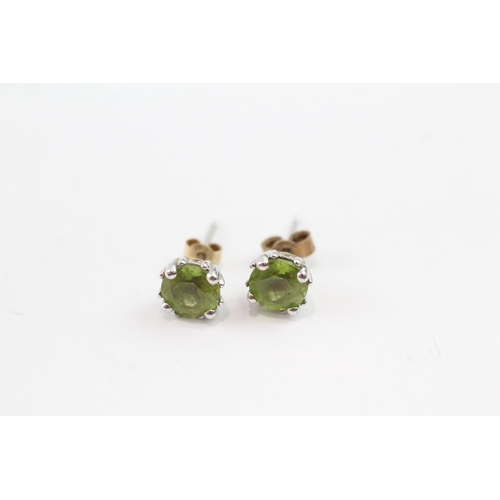 160 - 9ct white gold peridot stud earrings (1.4g)