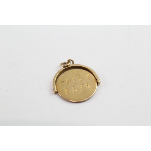 163 - 9ct gold 'I Love You' spin charm (1g)