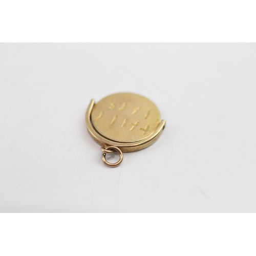 163 - 9ct gold 'I Love You' spin charm (1g)