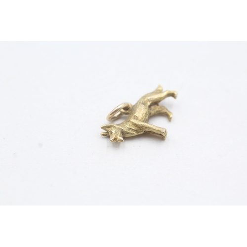 176 - 9ct gold dog charm (2.3g)