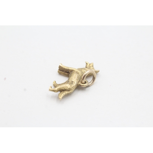 176 - 9ct gold dog charm (2.3g)