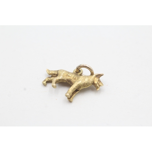 176 - 9ct gold dog charm (2.3g)