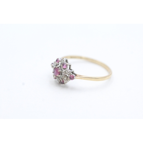 181 - 9ct gold diamond and ruby floral cluster ring (1.4g) Size P