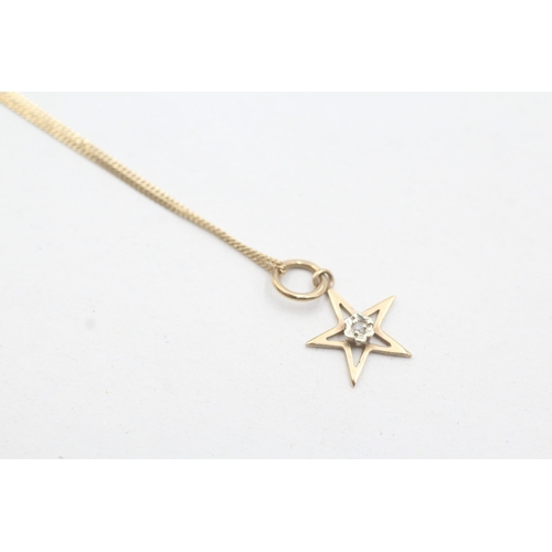 183 - 9ct gold diamond star pendant necklace (1.6g)