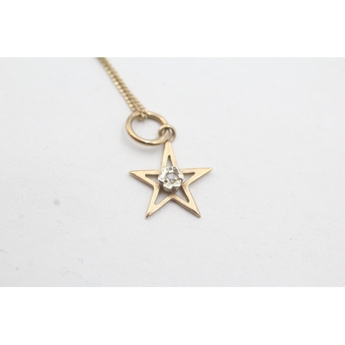 183 - 9ct gold diamond star pendant necklace (1.6g)