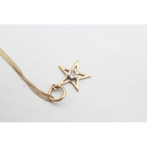 183 - 9ct gold diamond star pendant necklace (1.6g)