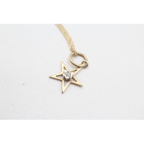 183 - 9ct gold diamond star pendant necklace (1.6g)