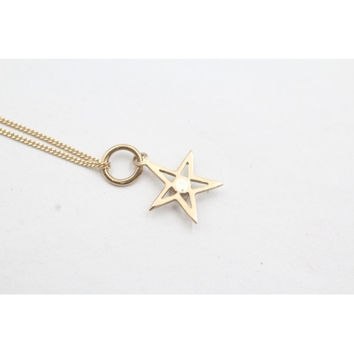 183 - 9ct gold diamond star pendant necklace (1.6g)