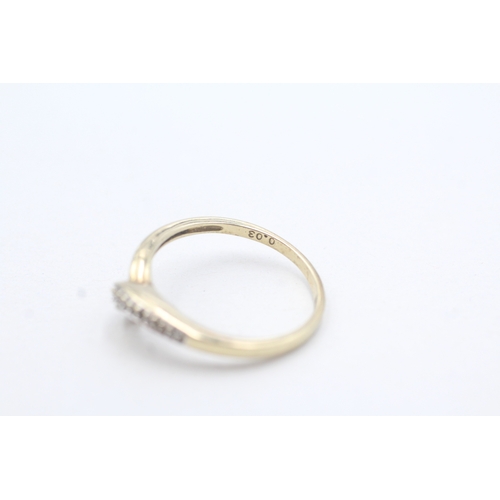 189 - 2 x 9ct gold diamond twist rings (3.8g)