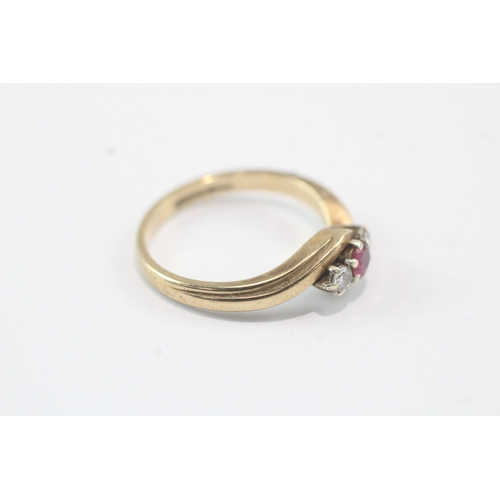 19 - 9ct gold diamond & ruby trilogy bypass ring (2.8g) Size O