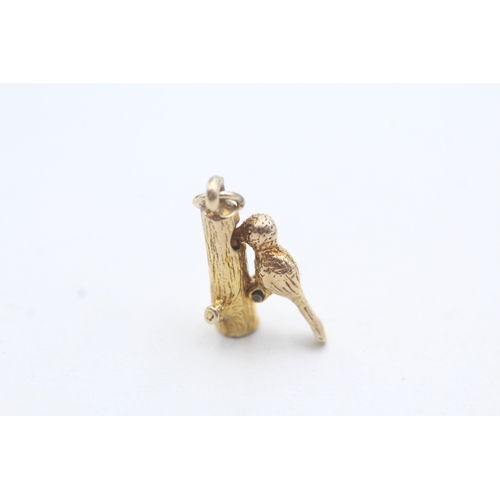 194 - 9ct gold wood pecker charm (2.5g)