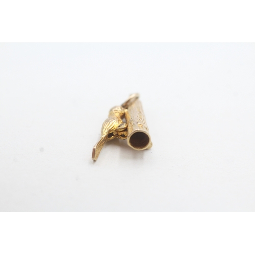 194 - 9ct gold wood pecker charm (2.5g)