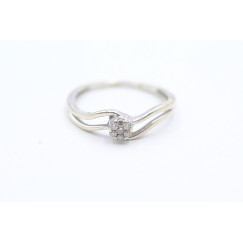 195 - 9ct white gold diamond cluster ring (2.3g) Size R