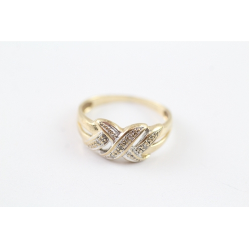 24 - 9ct gold diamond twist dress ring (1.8g) Size K