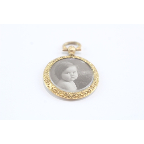 27 - 9ct gold picture locket (5g)