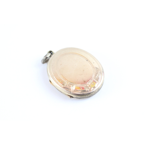 32 - 9ct gold back and front locket (9.9g)