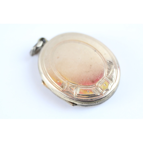 32 - 9ct gold back and front locket (9.9g)