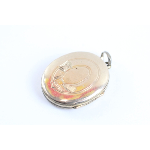 32 - 9ct gold back and front locket (9.9g)