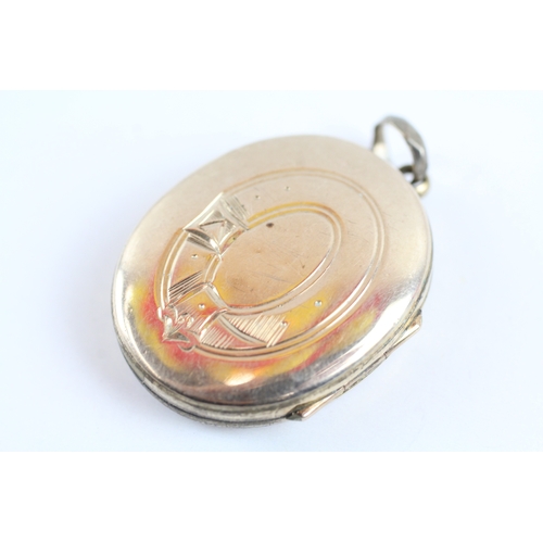 32 - 9ct gold back and front locket (9.9g)