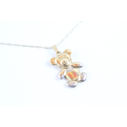 47 - 9ct gold teddy bear pendant on chain (1.1g)