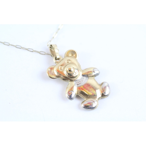 47 - 9ct gold teddy bear pendant on chain (1.1g)