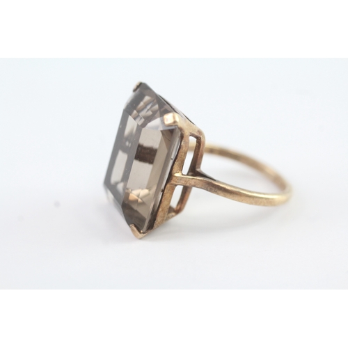 48 - 9ct gold smokey quartz cocktail ring (7.3g) Size N