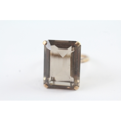 48 - 9ct gold smokey quartz cocktail ring (7.3g) Size N