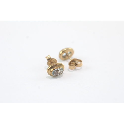 49 - 9ct gold blue topaz stud earrings (1.8g)