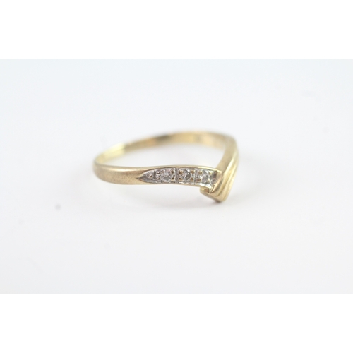 56 - 9ct gold diamond bypass dress ring (1.6g) Size N