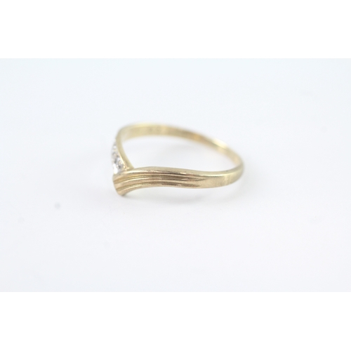 56 - 9ct gold diamond bypass dress ring (1.6g) Size N