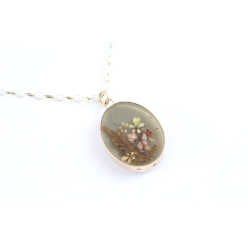 59 - 9ct gold antique dried botanical pendant necklace (2.3g)