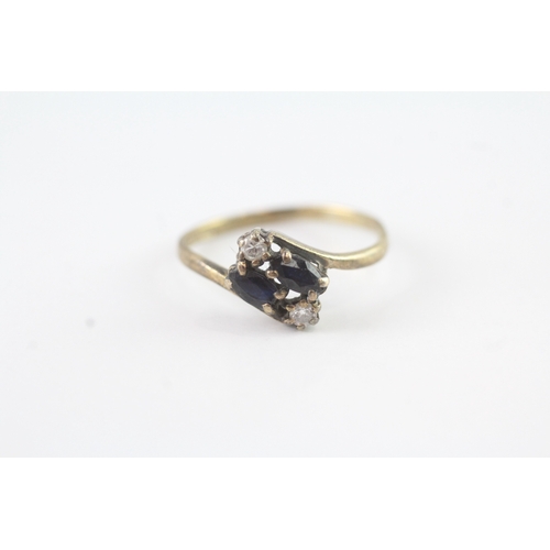 69 - 9ct gold diamond & sapphire four stone dress ring (1.4g) Size L