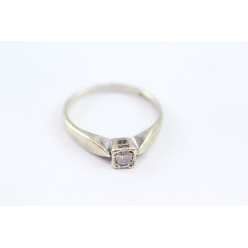 7 - 9ct gold diamond solitaire dress ring (2.3g) Size N 1/2