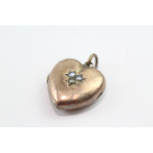 76 - 9ct gold back + front star set pearl heart locket (3.3g)