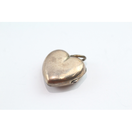 76 - 9ct gold back + front star set pearl heart locket (3.3g)