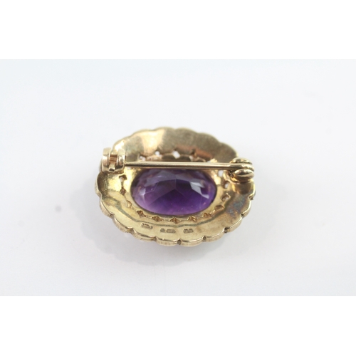78 - 9ct gold amethyst and split pearl set brooch (4.8g)