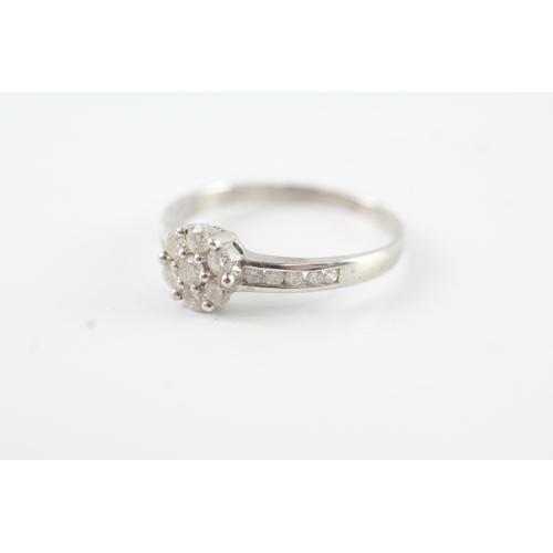 83 - 9ct white gold diamond set cluster ring (2.2g) Size R