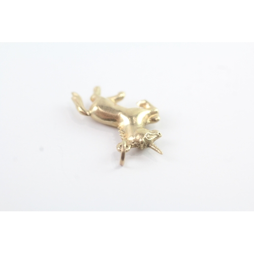 84 - 9ct gold unicorn charm (0.9g)