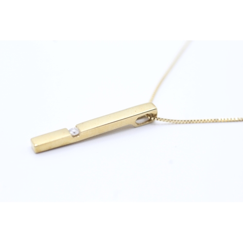 102 - 9ct gold diamond bar pendant on chain (1.7g)