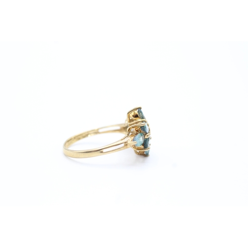 105 - 9ct gold diamond and green gemstone ring (2.7g) Size N