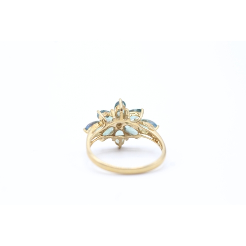 105 - 9ct gold diamond and green gemstone ring (2.7g) Size N