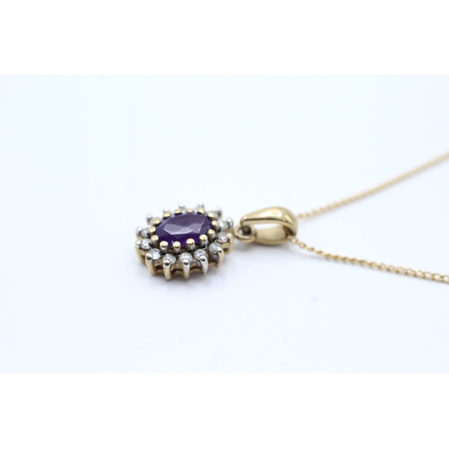 114 - 9ct gold amethyst and diamond halo pendant on chain (1.9g)