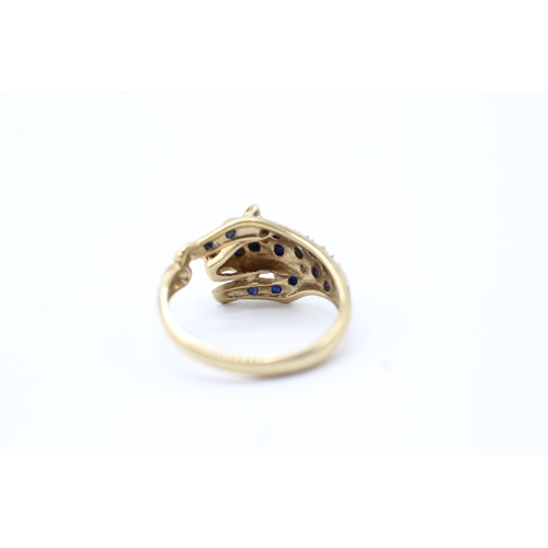 116 - 9ct gold diamond and sapphire jaguar ring (2.9g) Size N